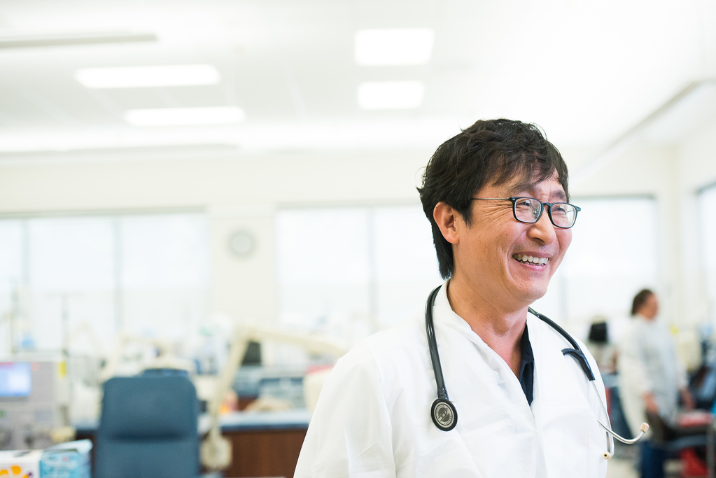 Dr Jason Pang, Nephrologist, smiling at work